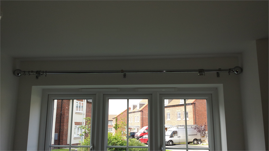 Curtain Pole Installation.