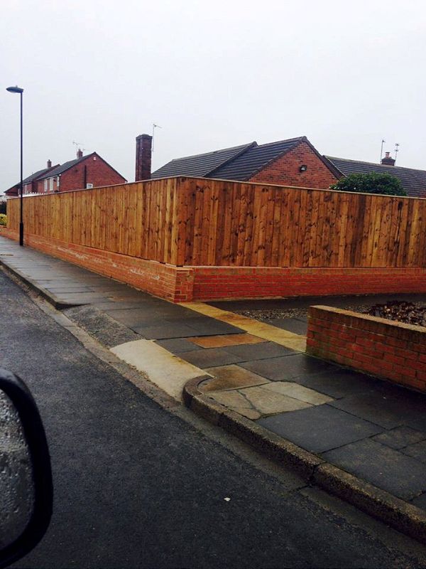Fence on top of wall