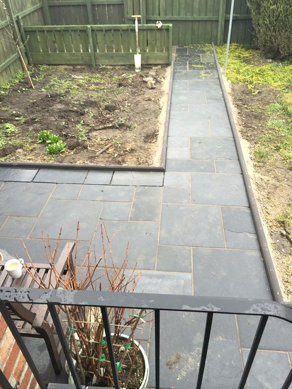 Old paving taking up and new patio put down