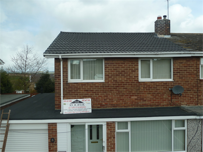 Full tile roof and joining flat roof