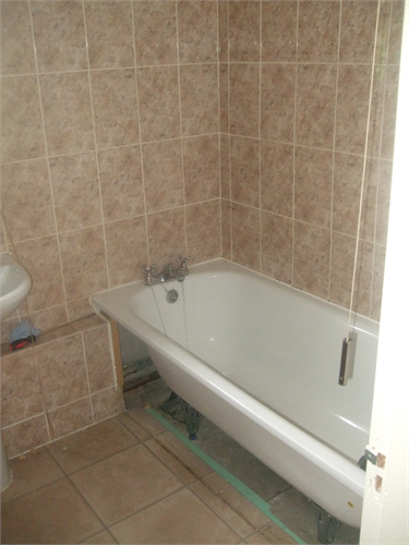 Bath conversion to shower enclosure